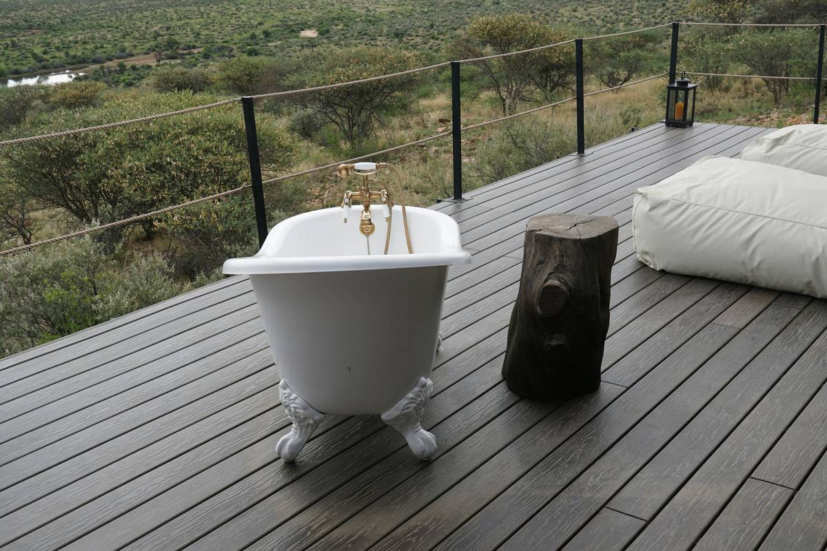 Side-by-side comparison of authentic vs reproduction claw feet for bathtub showing material and craftsmanship differences