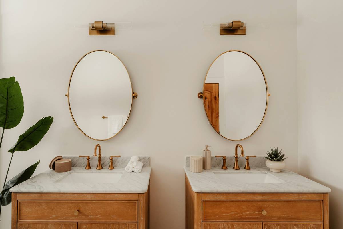 clawfoot bathtub bathroom design with vintage faucet and subway tile backdrop